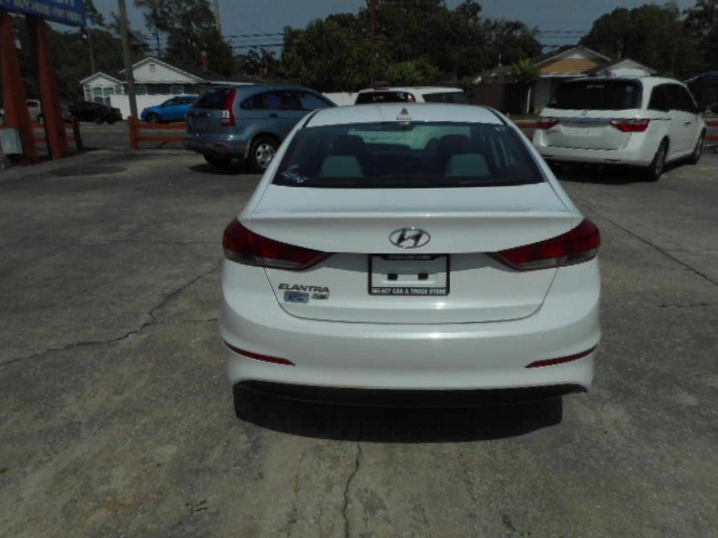 2017 WHITE HYUNDAI ELANTRA LIMITED; SE (5NPD74LFXHH) , located at 1200 Cassat Avenue, Jacksonville, FL, 32205, (904) 695-1885, 30.302404, -81.731033 - Photo#3